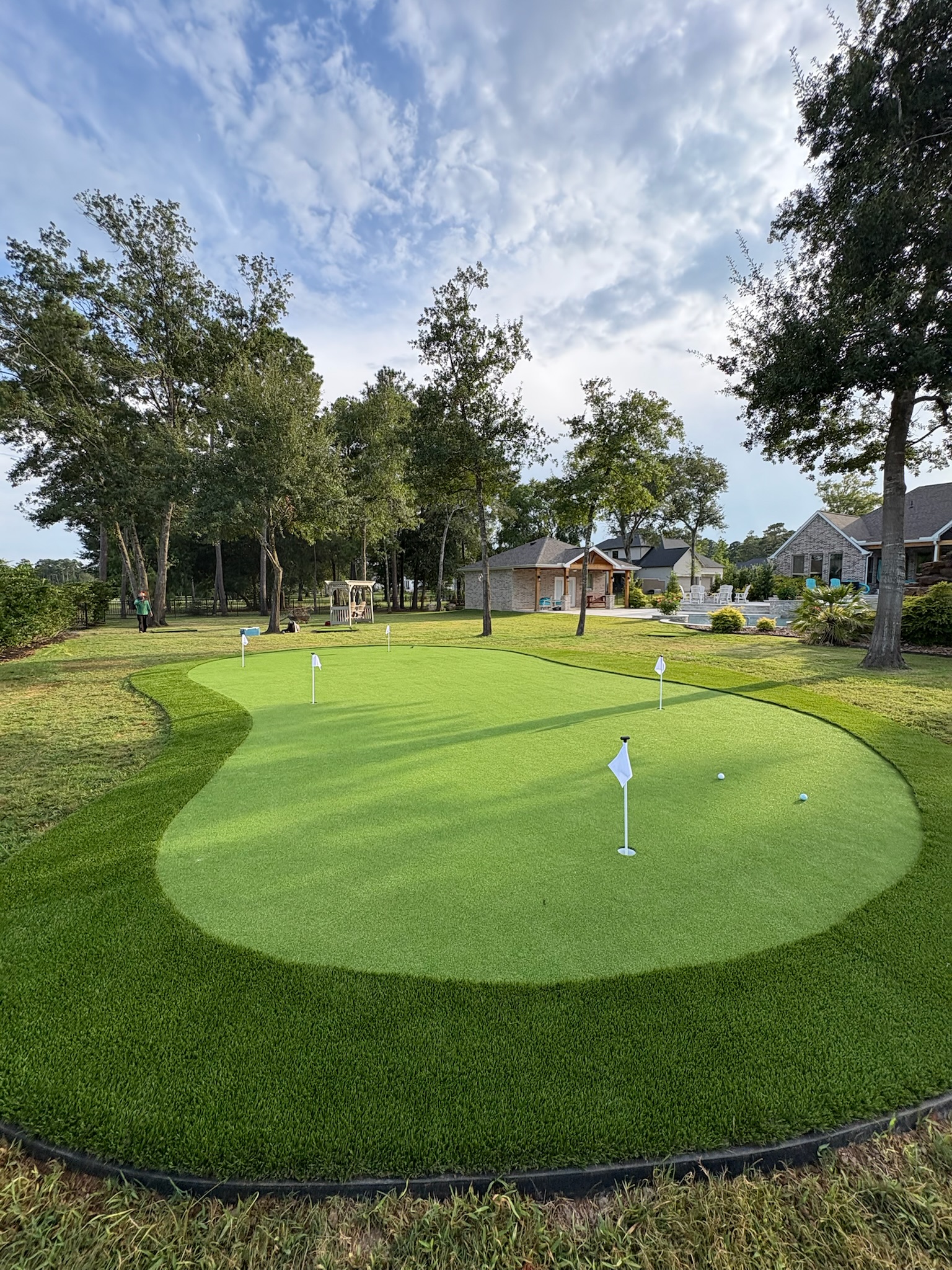 Custom synthetic putting green installation process