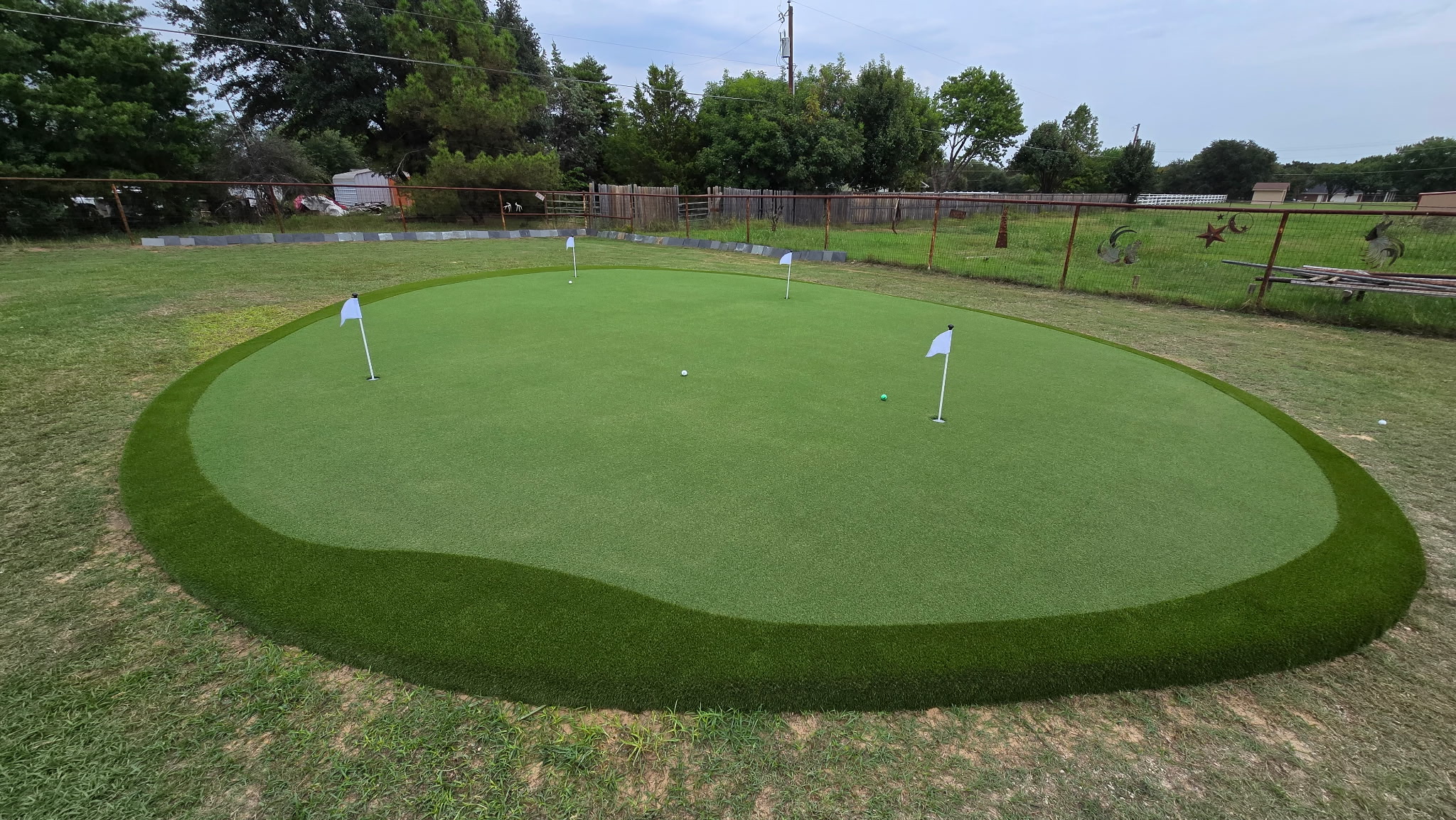 Custom synthetic putting green installation process