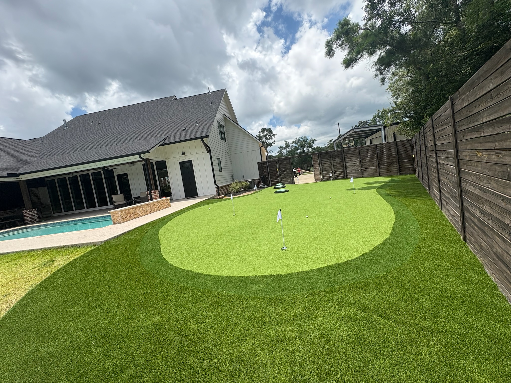 Custom synthetic putting green installation process