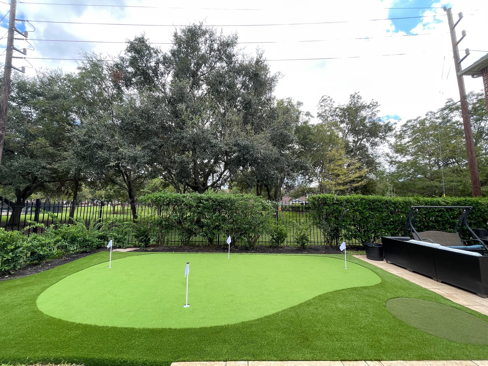 Custom synthetic putting green installation process