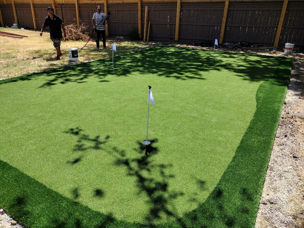 Custom synthetic putting green installation process