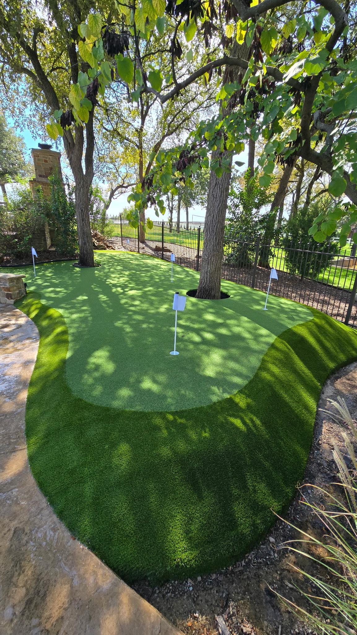 Custom synthetic putting green installation process