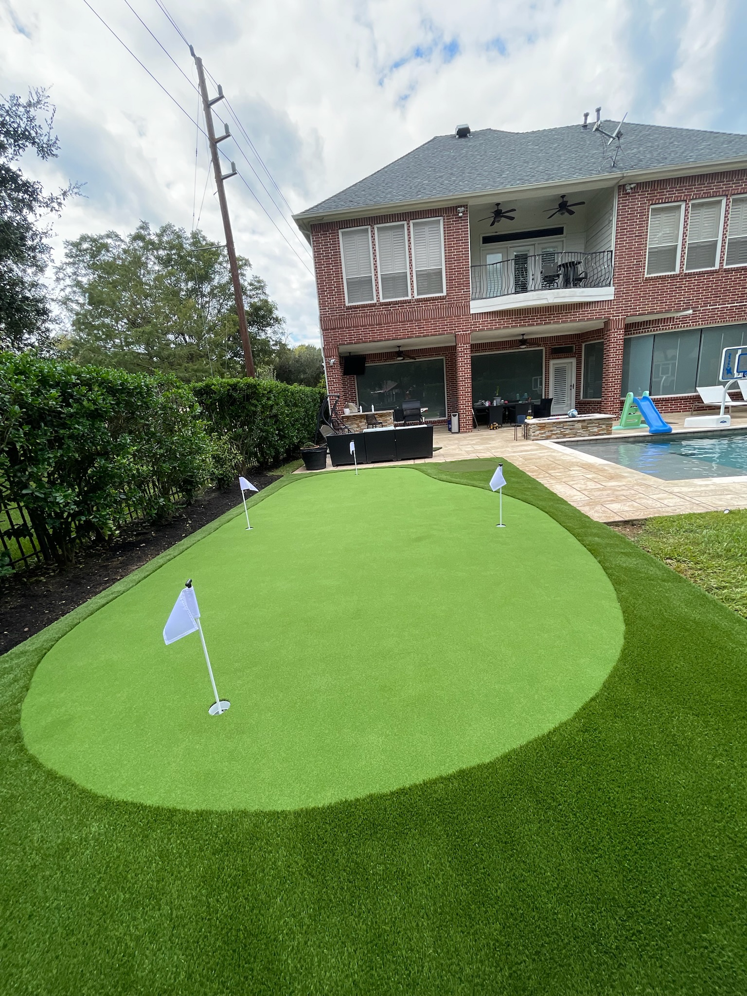 Custom synthetic putting green installation process