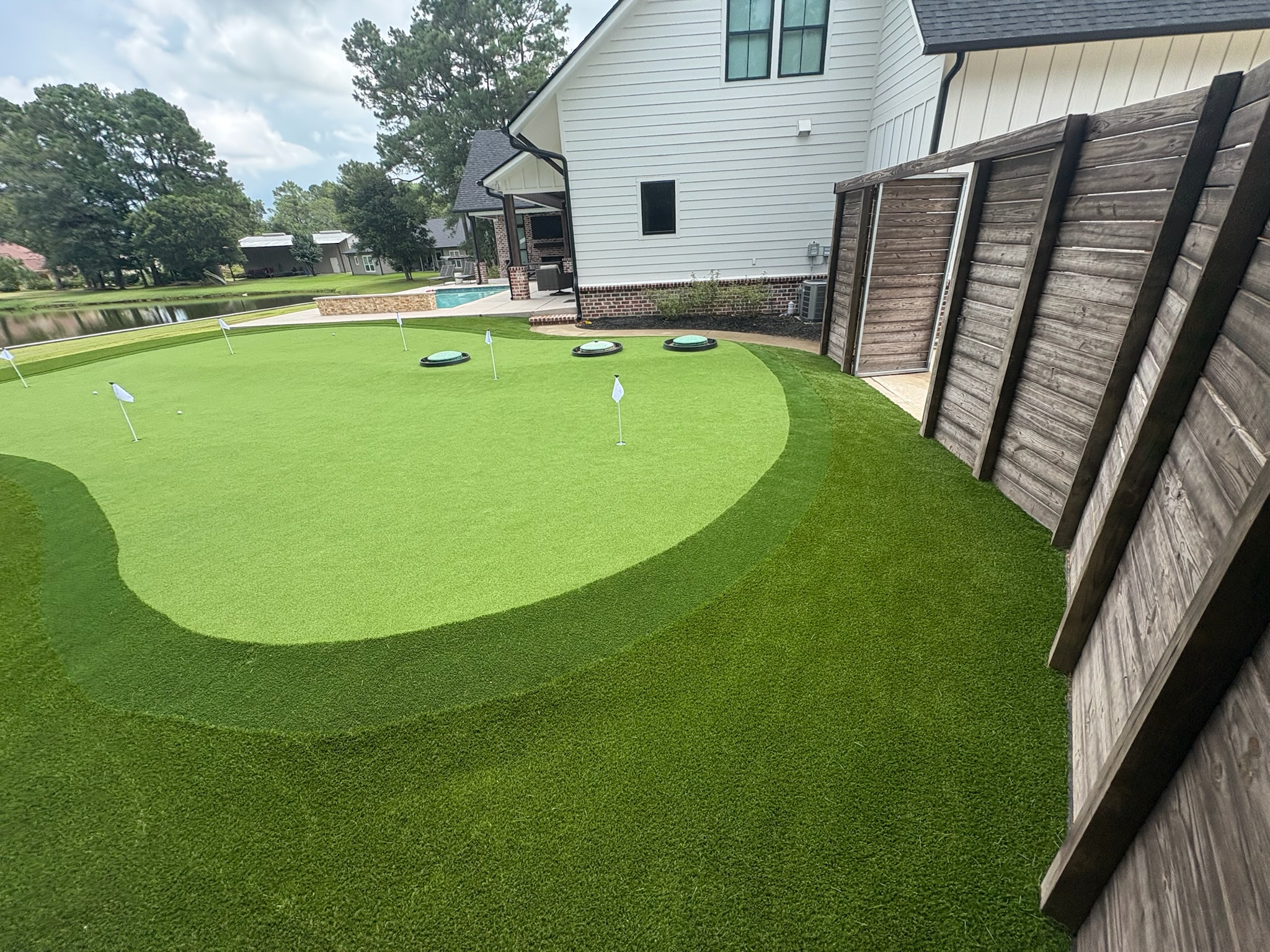 Custom synthetic putting green installation process