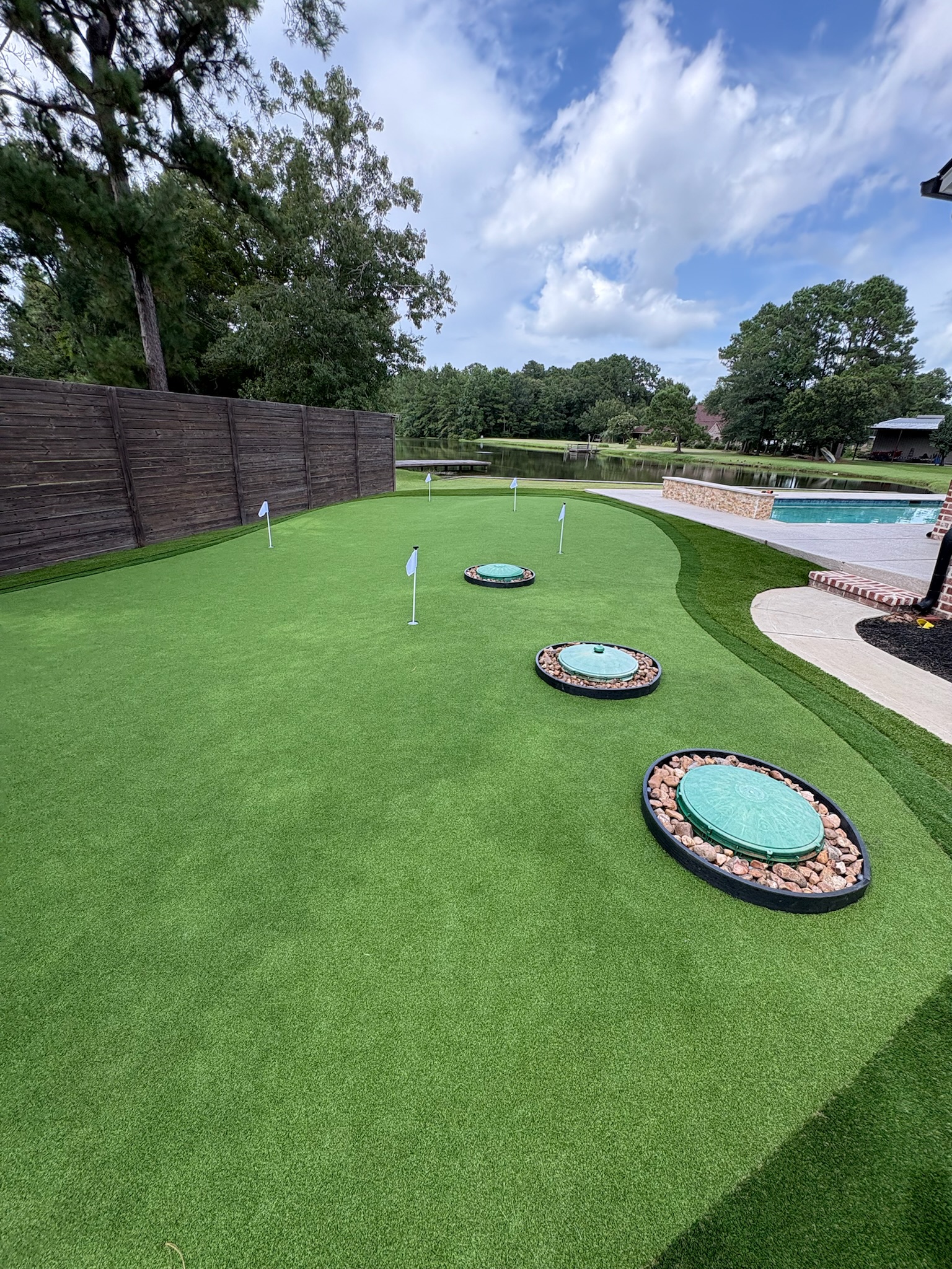 Custom synthetic putting green installation process