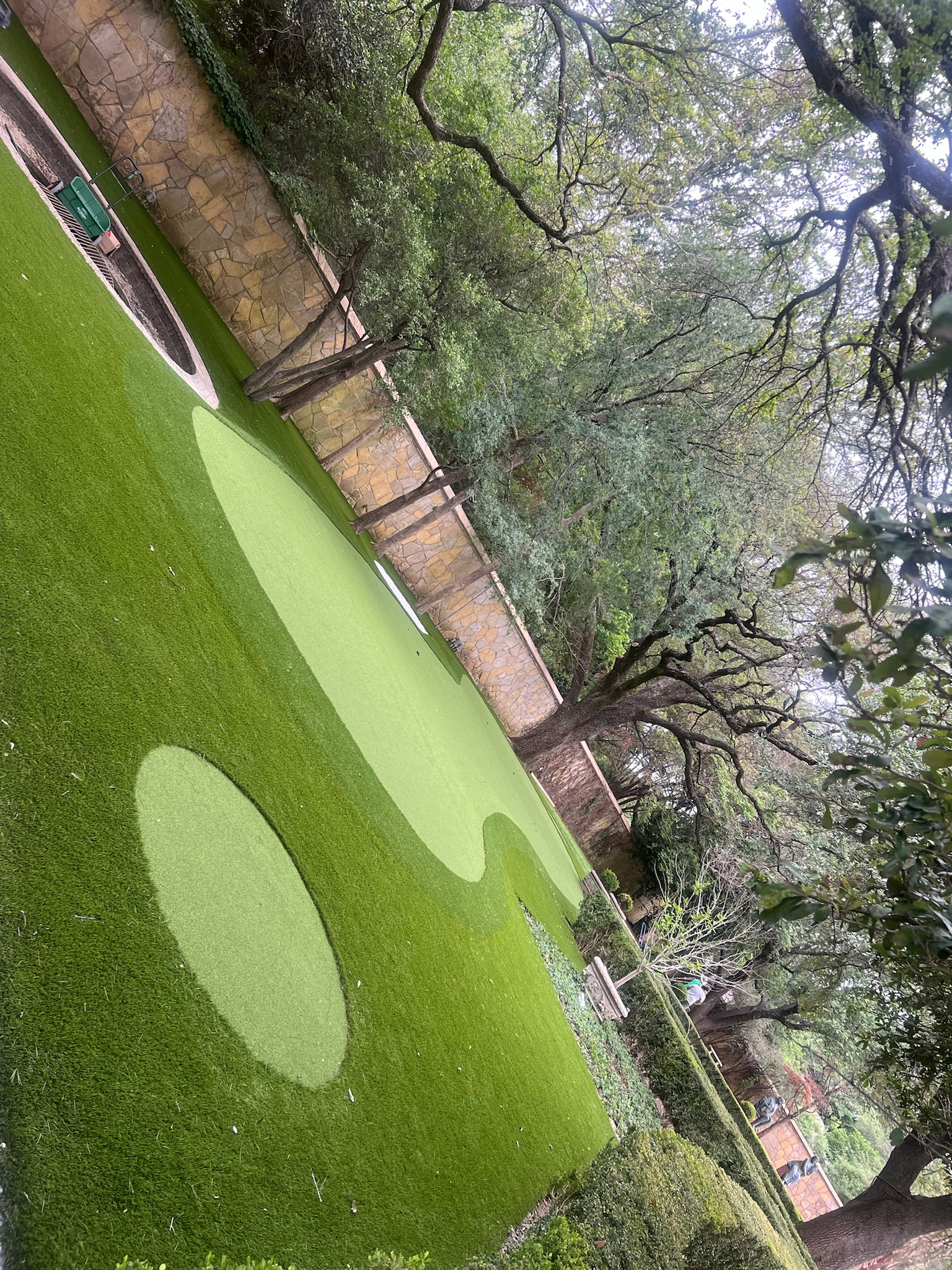 Custom synthetic putting green installation process