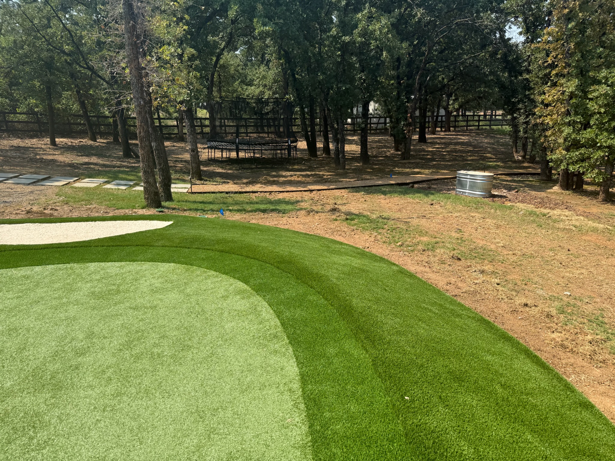 Custom synthetic putting green installation process