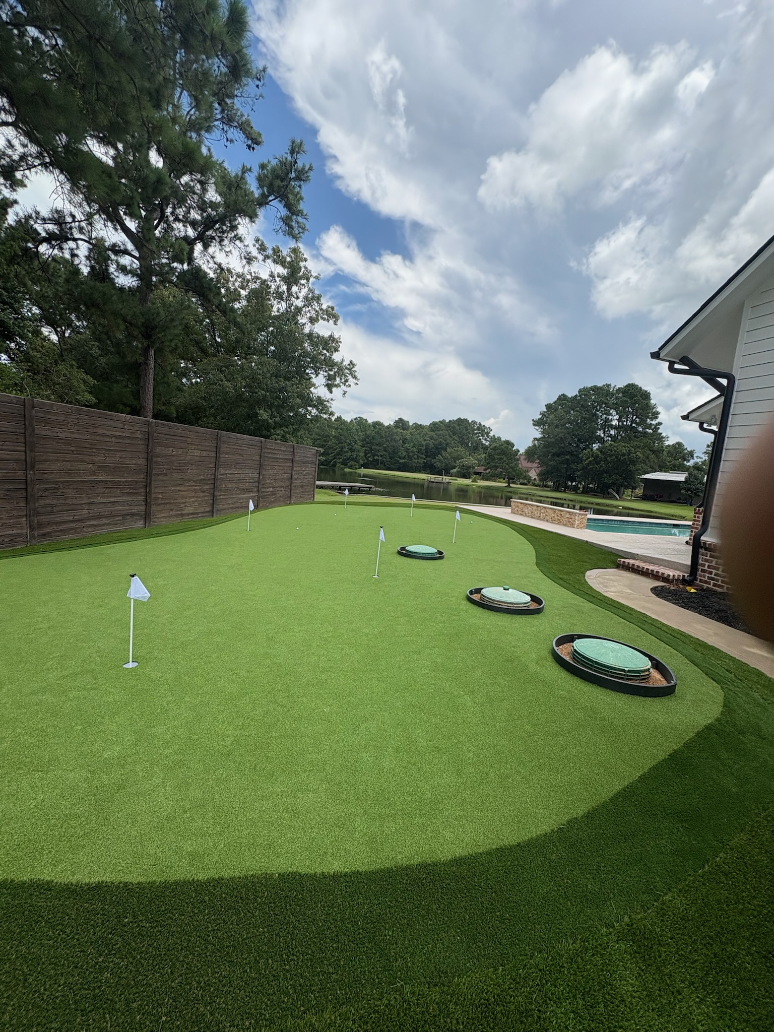 Custom synthetic putting green installation process