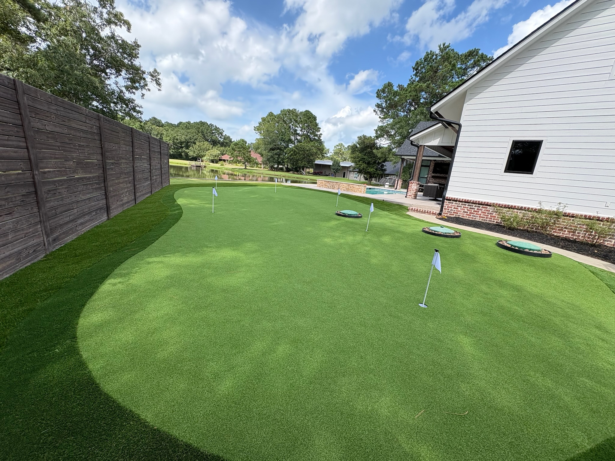 Custom synthetic putting green installation process