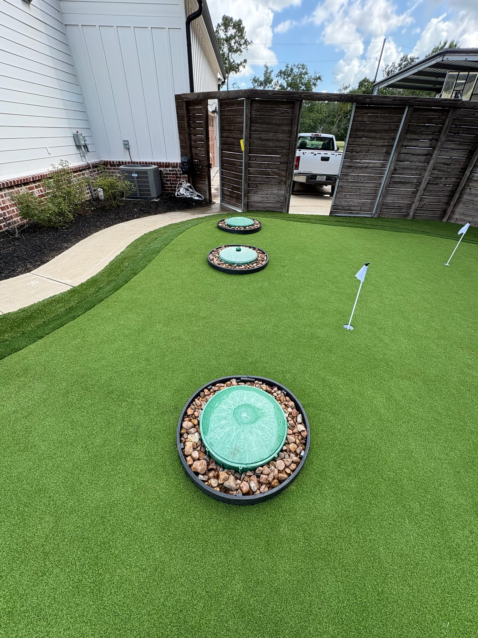Custom synthetic putting green installation process