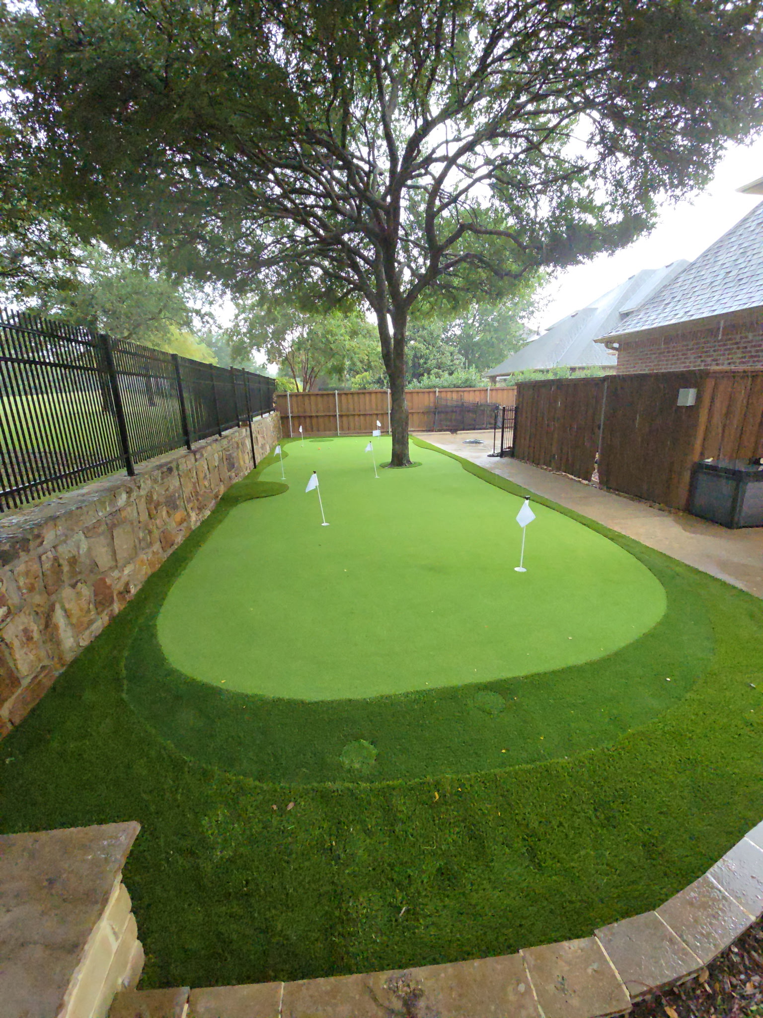 Custom synthetic putting green installation process