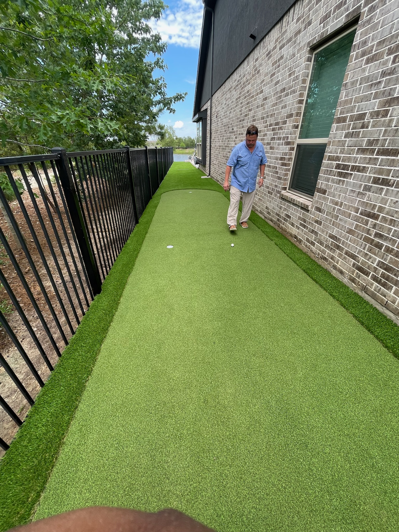 Custom synthetic putting green installation process